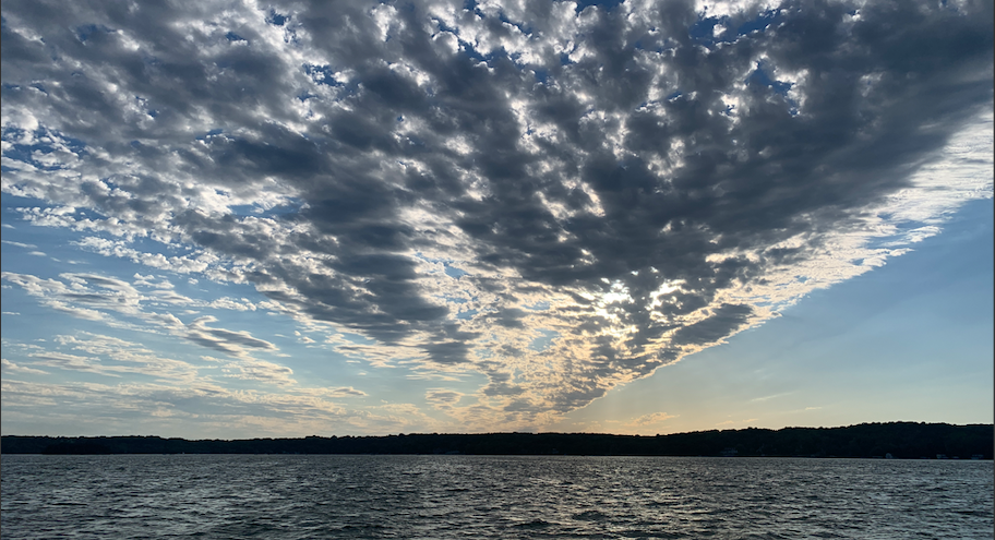 Gorgeous cloud-filled sunset over a Wisconsin Lake